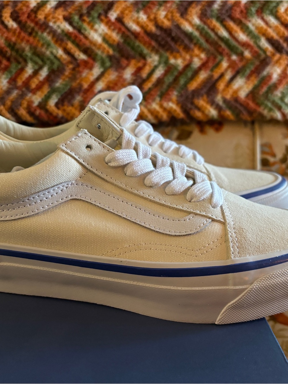 Vans Low-Top Canvas Sneakers in White with Blue Stripe